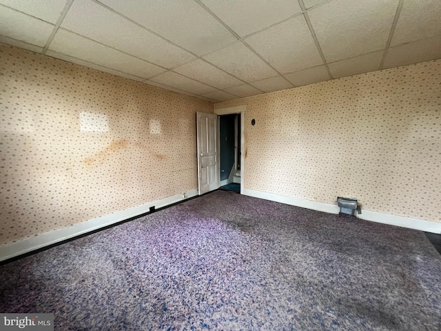 221 S State St, Talmage, PA 17580 - empty room with a drop ceiling, carpet floors, wallpapered walls, and baseboards