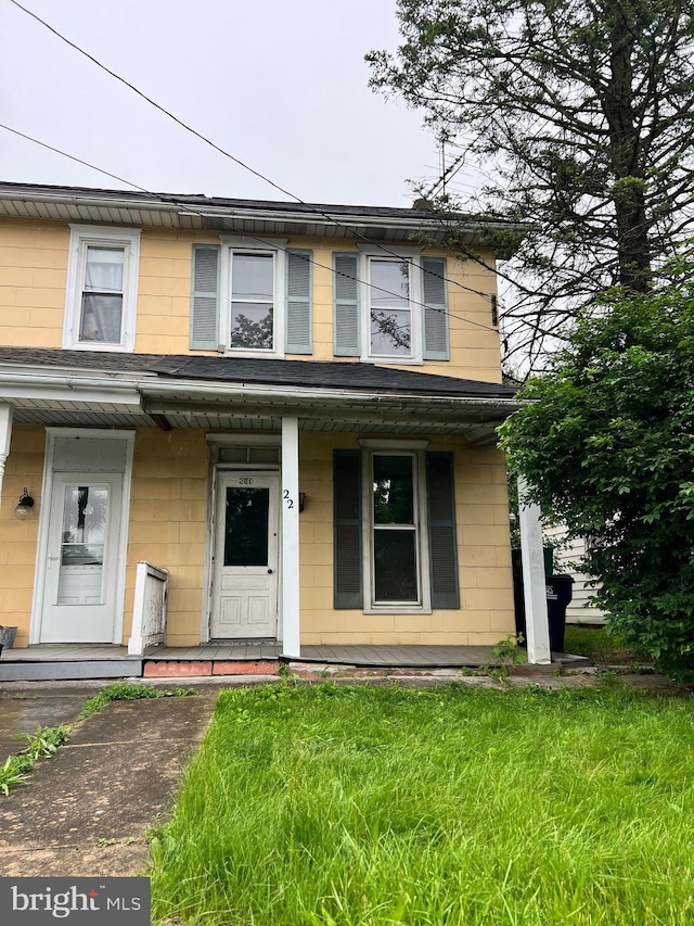 221 S State St, Talmage, PA 17580 - view of front facade with a porch and a front lawn