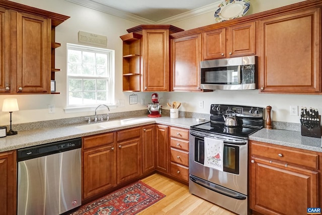 332 Overview St, Waynesboro, VA 22980 - kitchen featuring stainless steel appliances, open shelves, a sink, brown cabinetry, and ornamental molding