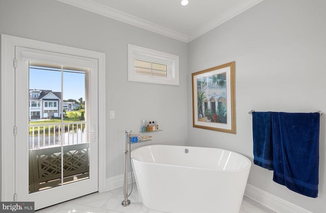 64 Blackpool Rd, Rehoboth Beach, DE 19971 - bathroom featuring a freestanding tub, baseboards, ornamental molding, and marble finish floors