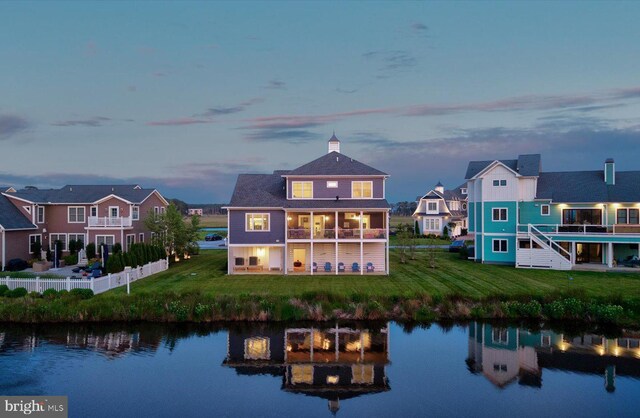 64 Blackpool Rd, Rehoboth Beach, DE 19971 - back of property featuring a water view and a balcony
