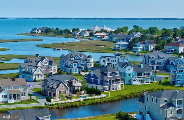 64 Blackpool Rd, Rehoboth Beach, DE 19971 - aerial perspective of suburban area featuring a large body of water