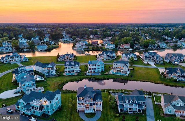 64 Blackpool Rd, Rehoboth Beach, DE 19971 - aerial view at dusk of a water view and a residential view