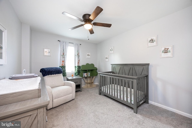 106 Everest Cir Unit 106, West Chester, PA 19382 - carpeted bedroom featuring a crib, baseboards, and ceiling fan