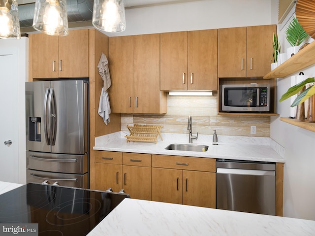 200 Lincoln Ave Unit 213, Phoenixville, PA 19460 - kitchen with appliances with stainless steel finishes, a sink, open shelves, decorative backsplash, and brown cabinetry