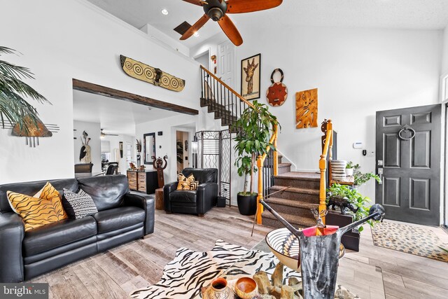 68 Winthrop Rd, Monroe Township, NJ 08831 - living area with high vaulted ceiling, a ceiling fan, stairs, and light wood-type flooring