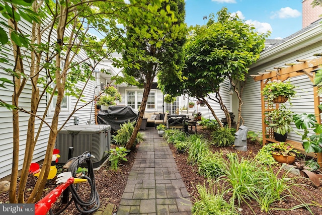 68 Winthrop Rd, Monroe Township, NJ 08831 - view of yard with central AC, a pergola, and a patio