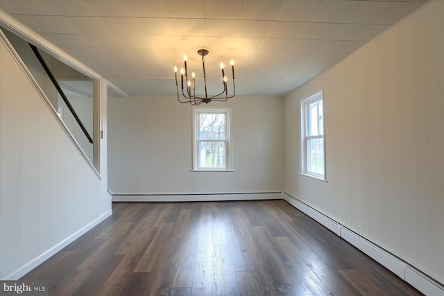 323 Plaza Dr, Palmyra, PA 17078 - unfurnished dining area featuring baseboard heating, a chandelier, and dark wood-style flooring