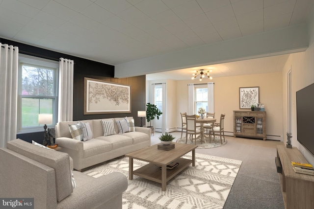323 Plaza Dr, Palmyra, PA 17078 - living room featuring a chandelier, light colored carpet, and baseboard heating