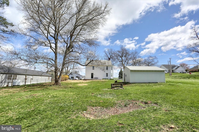 323 Plaza Dr, Palmyra, PA 17078 - view of grassy yard featuring an outbuilding
