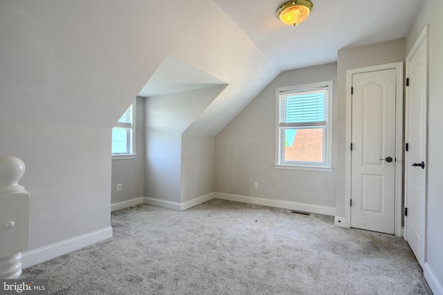 5221 Trumps Mill Rd, Baltimore, MD 21206 - additional living space with vaulted ceiling and carpet flooring