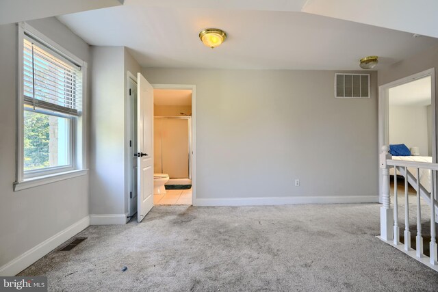 5221 Trumps Mill Rd, Baltimore, MD 21206 - carpeted empty room with baseboards