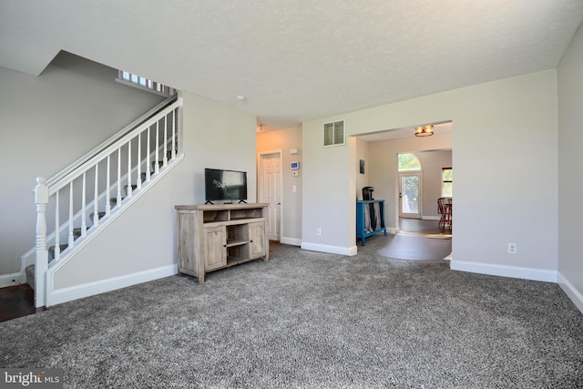 5221 Trumps Mill Rd, Baltimore, MD 21206 - carpeted living room featuring stairway and a textured ceiling