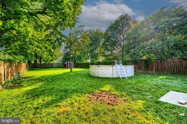 5221 Trumps Mill Rd, Baltimore, MD 21206 - fenced backyard with a storage shed