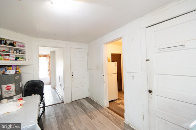 113 Washington St, Cambridge, MD 21613 - office area featuring light wood-style floors and crown molding