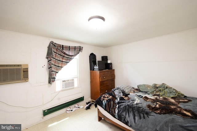 113 Washington St, Cambridge, MD 21613 - bedroom with tile patterned floors, an AC wall unit, and cooling unit