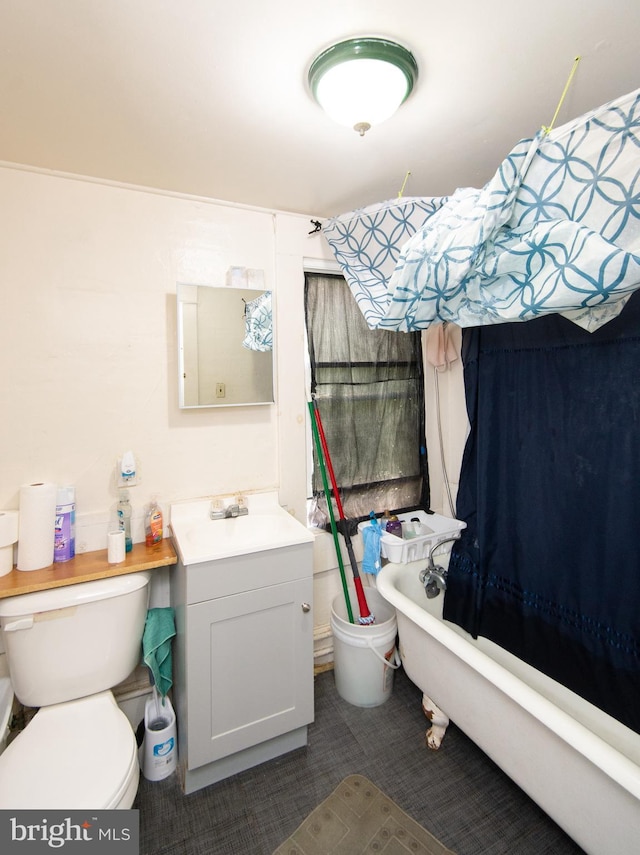 113 Washington St, Cambridge, MD 21613 - bathroom with a freestanding bath, toilet, and vanity