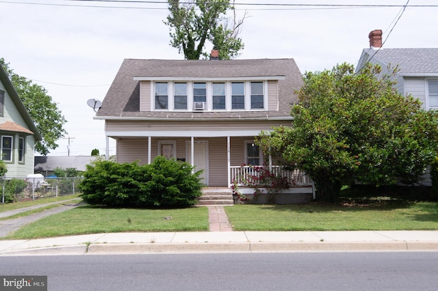 113 Washington St, Cambridge, MD 21613 - view of front of home with a porch and roof with shingles