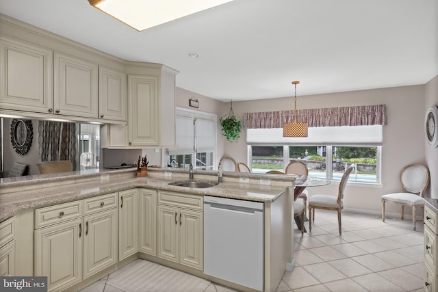 29 Dominion Dr, Marlton, NJ 08053 - kitchen with dishwasher, cream cabinetry, a sink, light tile patterned floors, and a peninsula