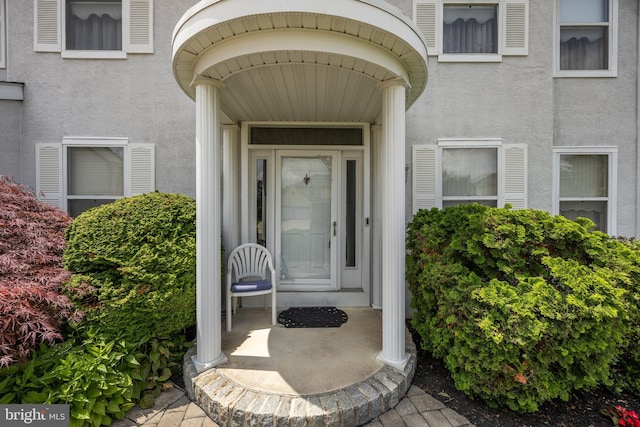 29 Dominion Dr, Marlton, NJ 08053 - doorway to property featuring stucco siding