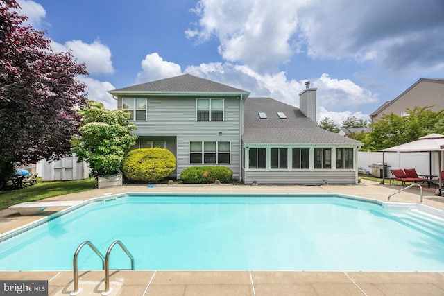 29 Dominion Dr, Marlton, NJ 08053 - view of pool with a sunroom, a patio area, and a diving board
