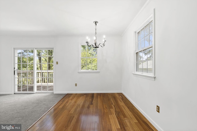 534 Hillcrest Ave, Glenside, PA 19038 - unfurnished room with a chandelier, dark wood-style flooring, baseboards, and ornamental molding