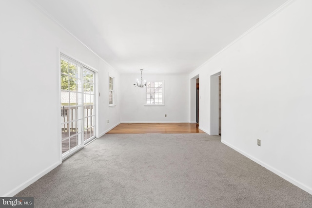 534 Hillcrest Ave, Glenside, PA 19038 - carpeted empty room with crown molding, a chandelier, and baseboards