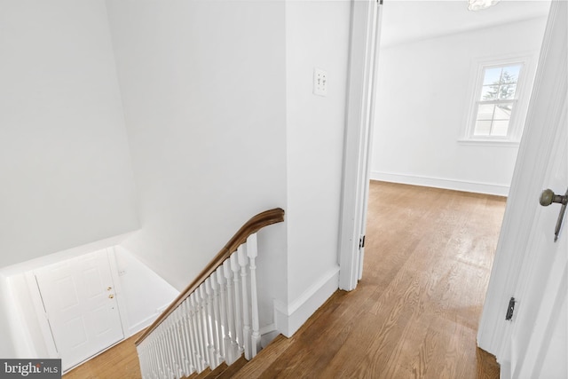534 Hillcrest Ave, Glenside, PA 19038 - hallway with an upstairs landing, wood finished floors, and baseboards