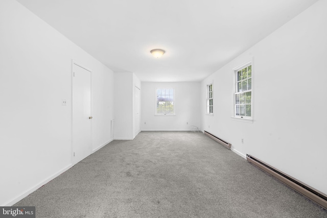 534 Hillcrest Ave, Glenside, PA 19038 - carpeted spare room featuring a baseboard heating unit and baseboards