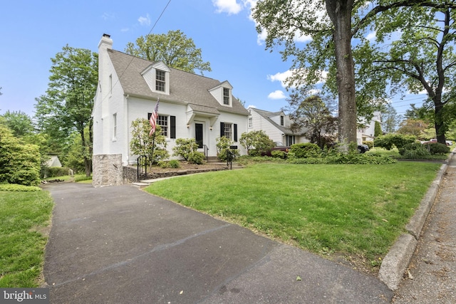534 Hillcrest Ave, Glenside, PA 19038 - cape cod home with a front lawn, a shingled roof, a chimney, and driveway