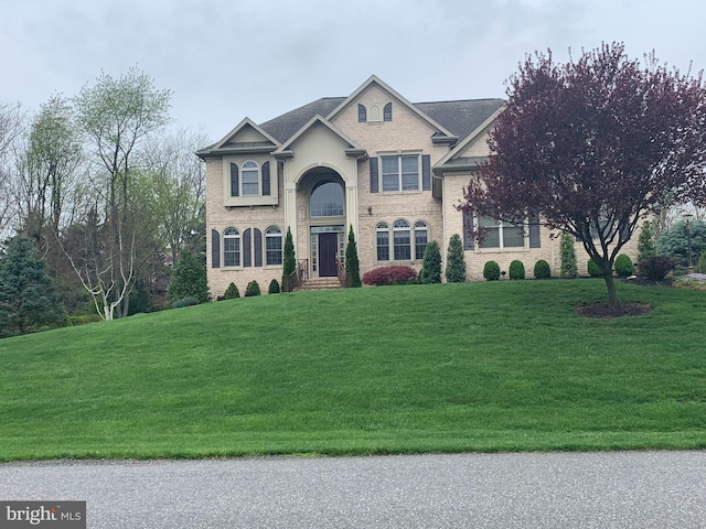 11028 Sani Ln, Hagerstown, MD 21742 - view of front of house featuring brick siding and a front lawn
