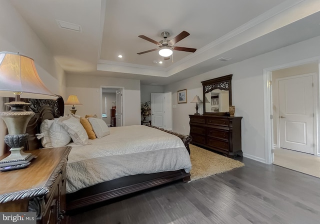 8716 Windon Ct, Waldorf, MD 20603 - bedroom featuring wood finished floors, recessed lighting, a raised ceiling, baseboards, and crown molding