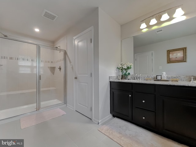 8716 Windon Ct, Waldorf, MD 20603 - bathroom featuring a stall shower, double vanity, and tile patterned floors