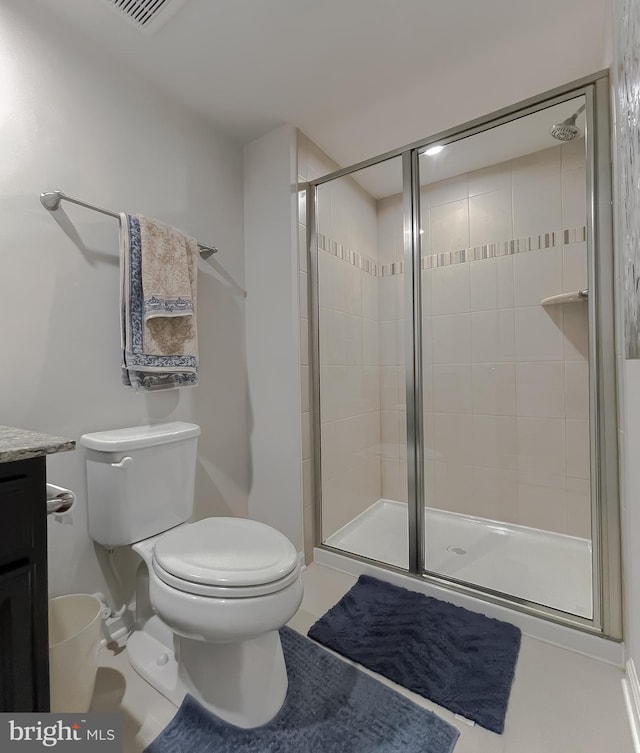 8716 Windon Ct, Waldorf, MD 20603 - bathroom featuring toilet, a stall shower, vanity, and tile patterned flooring