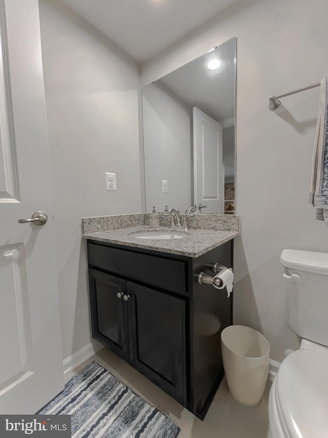 8716 Windon Ct, Waldorf, MD 20603 - bathroom featuring vanity, toilet, baseboards, and tile patterned floors