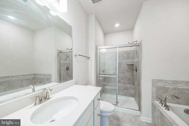 8039 Baxter St, Derwood, MD 20855 - bathroom with a garden tub, vanity, a shower stall, and toilet