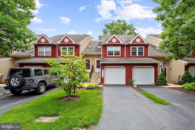 207 Fairfield Ct Unit 207, West Chester, PA 19382 - view of front facade featuring driveway, an attached garage, and a shingled roof