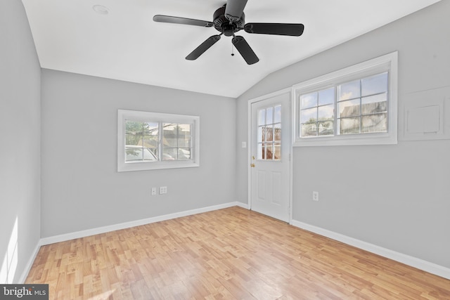 95 Twin Oak Dr, Levittown, PA 19056 - spare room with lofted ceiling, wood finished floors, baseboards, and a ceiling fan