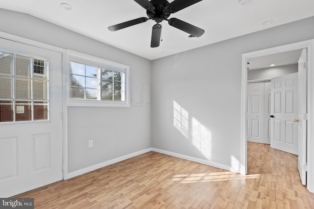 95 Twin Oak Dr, Levittown, PA 19056 - unfurnished bedroom featuring light wood-style flooring, baseboards, and a ceiling fan