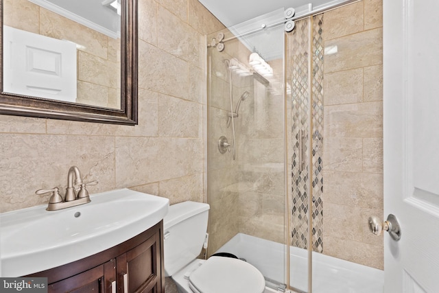 95 Twin Oak Dr, Levittown, PA 19056 - full bath featuring a stall shower, crown molding, tile walls, toilet, and vanity