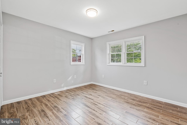 95 Twin Oak Dr, Levittown, PA 19056 - spare room featuring wood finished floors and baseboards