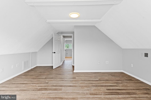 95 Twin Oak Dr, Levittown, PA 19056 - bonus room featuring wood finished floors, lofted ceiling, and baseboards