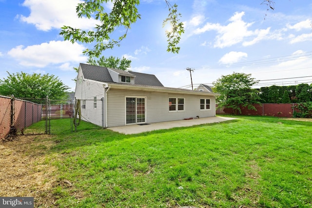 95 Twin Oak Dr, Levittown, PA 19056 - rear view of property with a patio area and a gate
