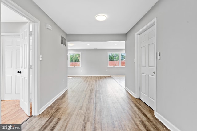 95 Twin Oak Dr, Levittown, PA 19056 - corridor with wood finished floors and baseboards