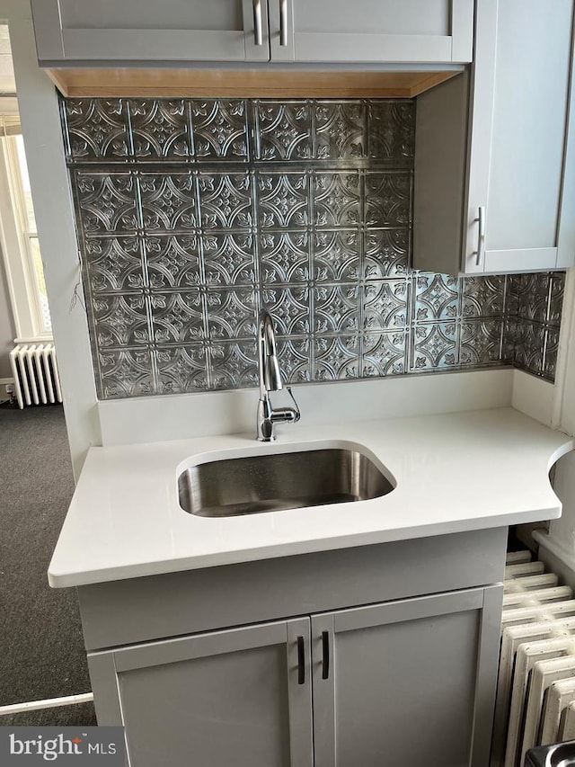3 E Mantua Ave, Wenonah, NJ 08090 - kitchen with a sink, radiator heating unit, gray cabinetry, and light countertops