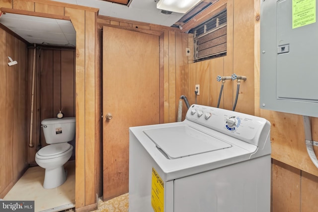 2824 Ashland Ave, Baltimore, MD 21205 - laundry room with washer / dryer, electric panel, and wood walls