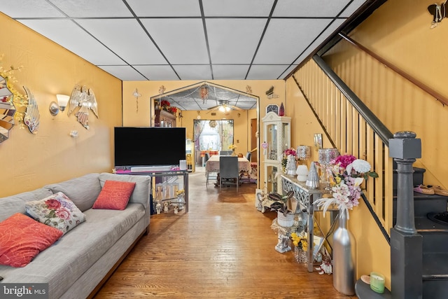 2824 Ashland Ave, Baltimore, MD 21205 - living room featuring wood-type flooring and a drop ceiling
