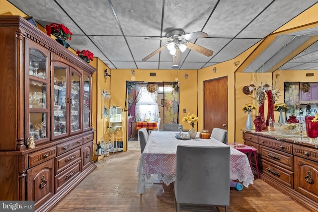 2824 Ashland Ave, Baltimore, MD 21205 - dining area with ceiling fan and wood finished floors