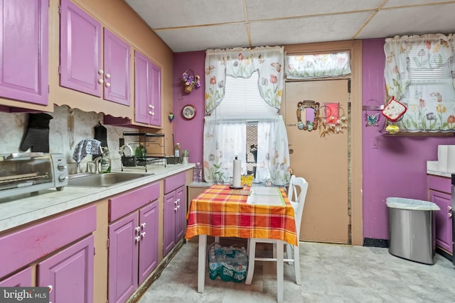 2824 Ashland Ave, Baltimore, MD 21205 - kitchen with a sink and light countertops