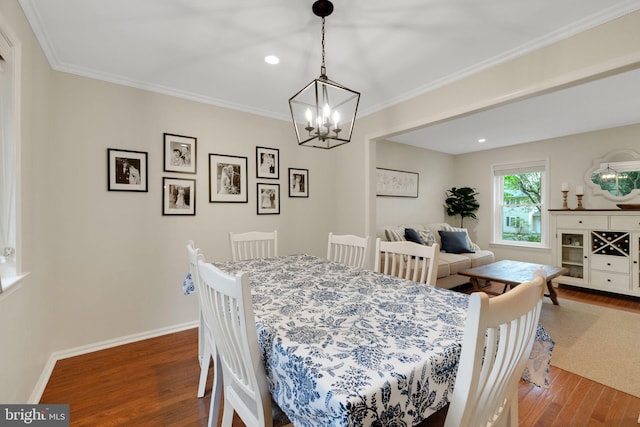 1995 Pierce Dr, Whitehall, PA 18052 - dining space featuring wood finished floors, crown molding, a chandelier, baseboards, and recessed lighting